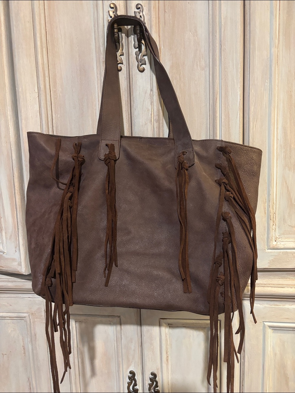 Claudia Firenze Fringed Shoulder Tote Bag in Dark Brown. Genuine leather.